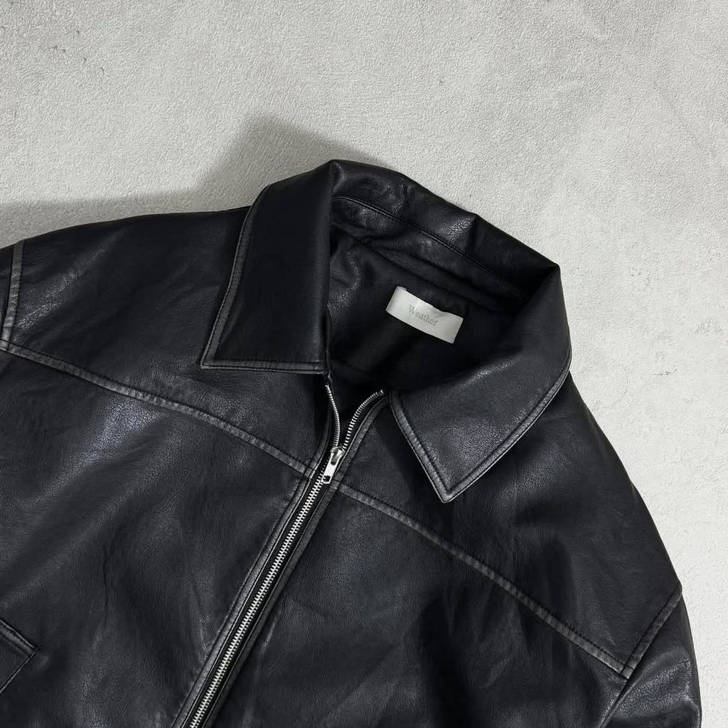 black leather (or faux-leather) bomber jacket