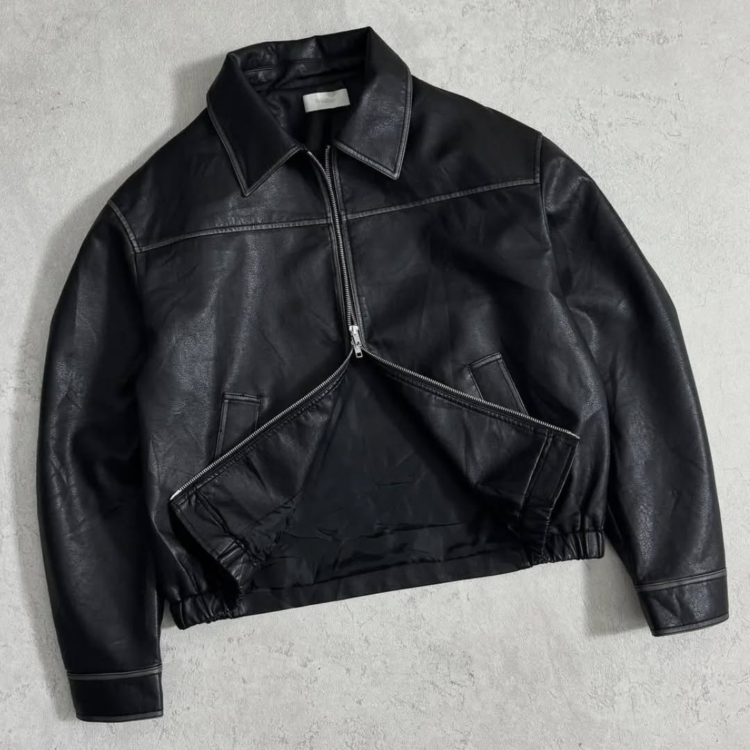 black leather (or faux-leather) bomber jacket