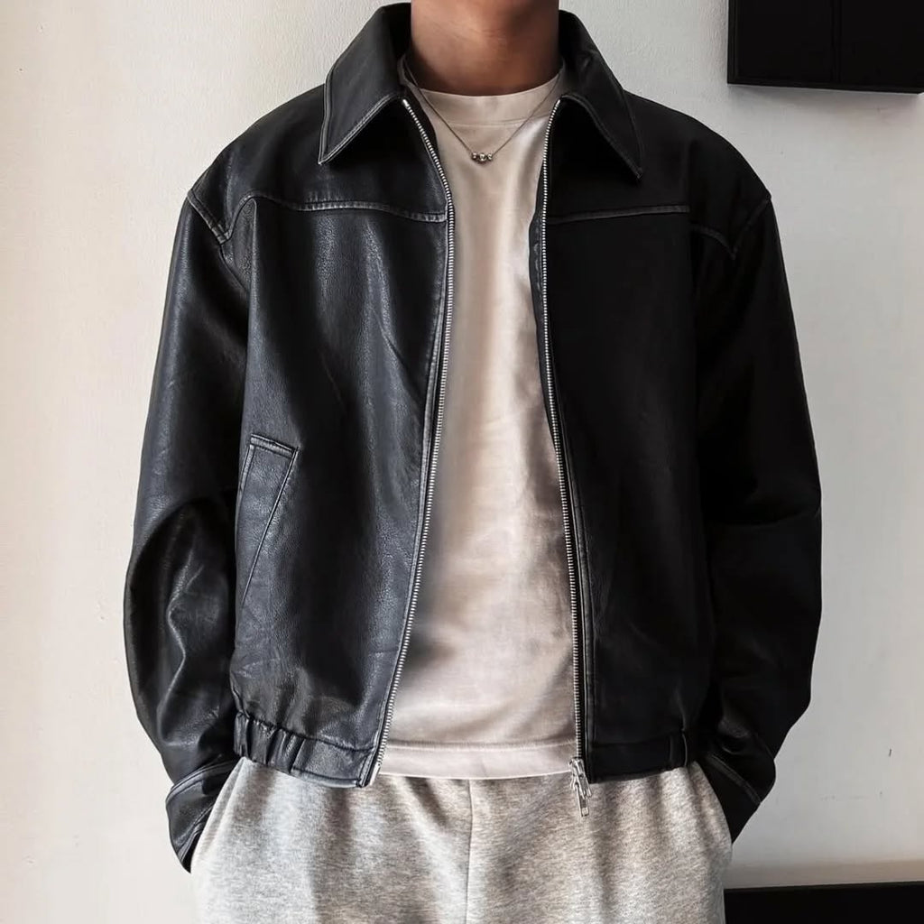 black leather (or faux-leather) bomber jacket