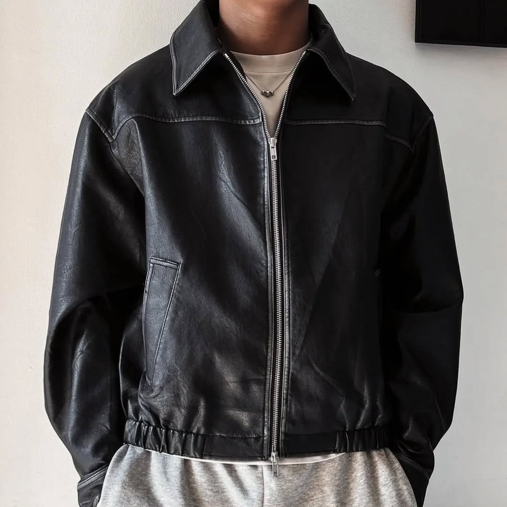 black leather (or faux-leather) bomber jacket