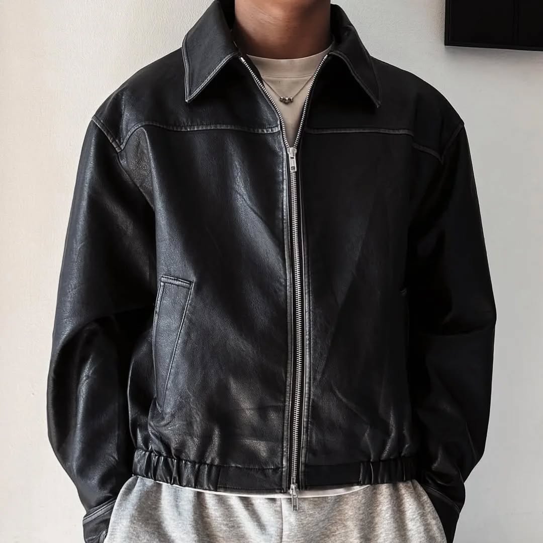 black leather (or faux-leather) bomber jacket