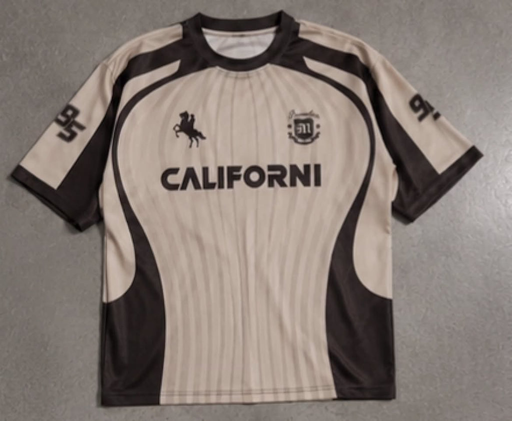 short-sleeved sports jersey or athletic t-shirt featuring a retro/motocross vibe