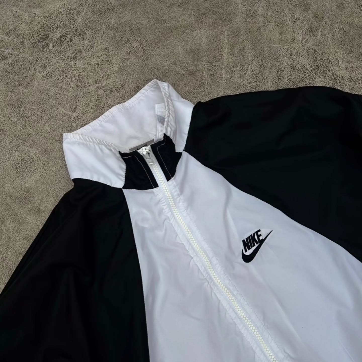 classic vintage Nike full-zip track jacket / windbreaker with a striking