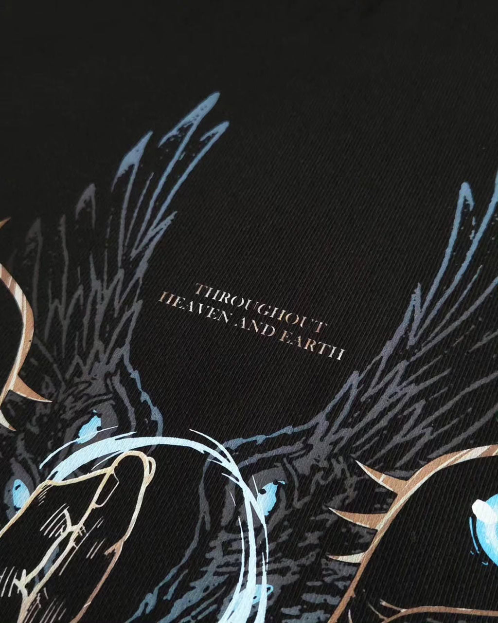 black pullover hoodie featuring an anime-inspired graphic design with dark fantasy