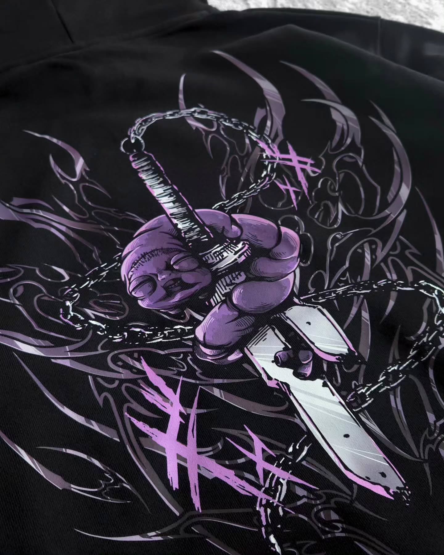 black pullover hoodie featuring an anime-inspired