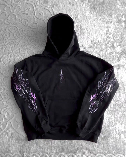 black pullover hoodie featuring an anime-inspired