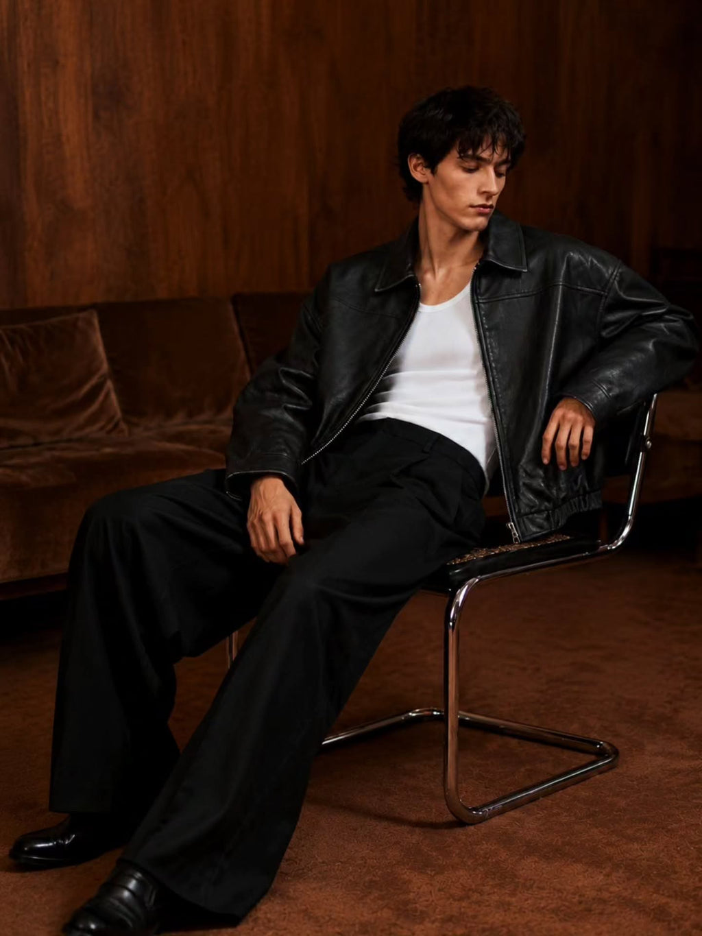 black leather (or faux-leather) bomber jacket