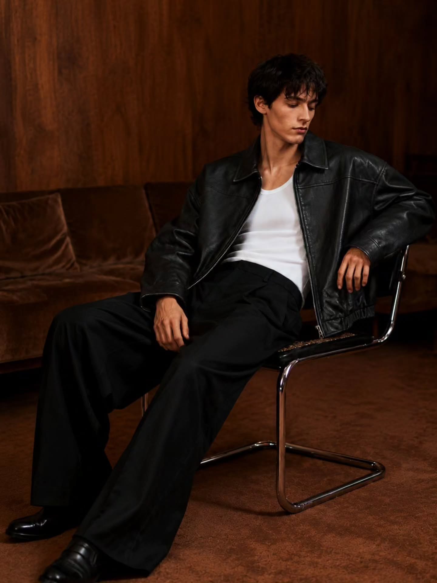 black leather (or faux-leather) bomber jacket