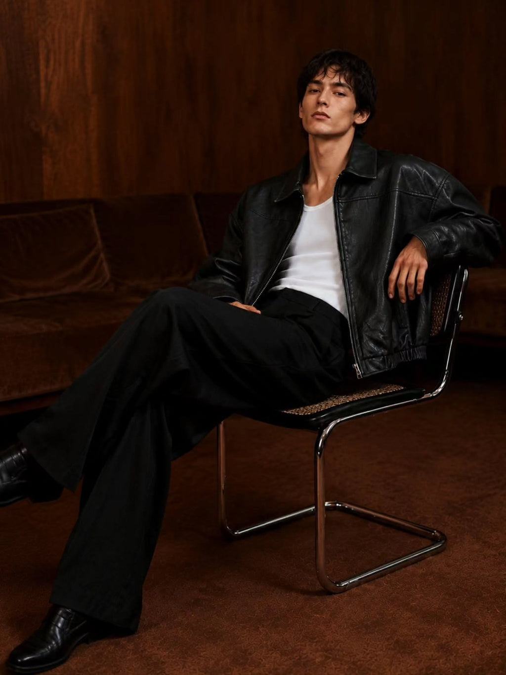 black leather (or faux-leather) bomber jacket